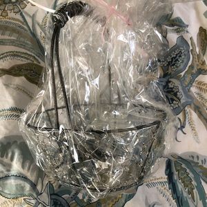New, decorative wire basket, wrapped in cellophane